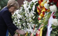German Chancellor Merkel attends wreath laying ceremony marking 50th anniversary of building of Berlin Wall in Berlin